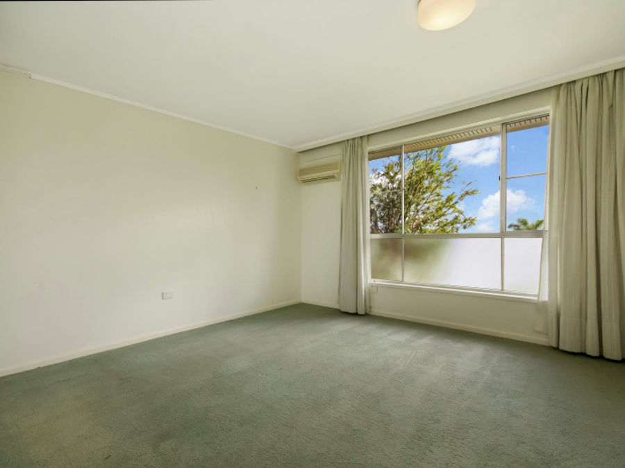 Bedroom 1 with view to Mt Coolum
