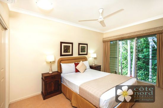 Spacious second bedroom with rainforest garden vie