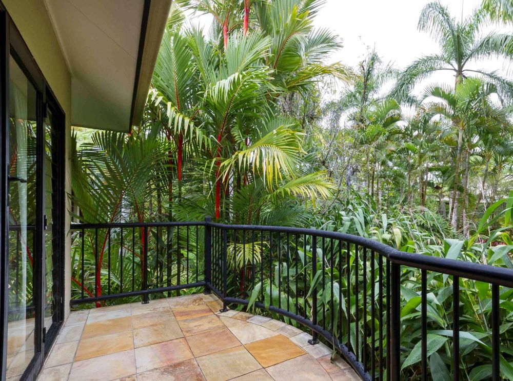Balcony views over gardens and to the pool