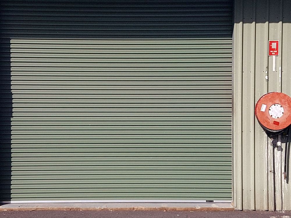 Secure rolladoor to main entrance of this commerci