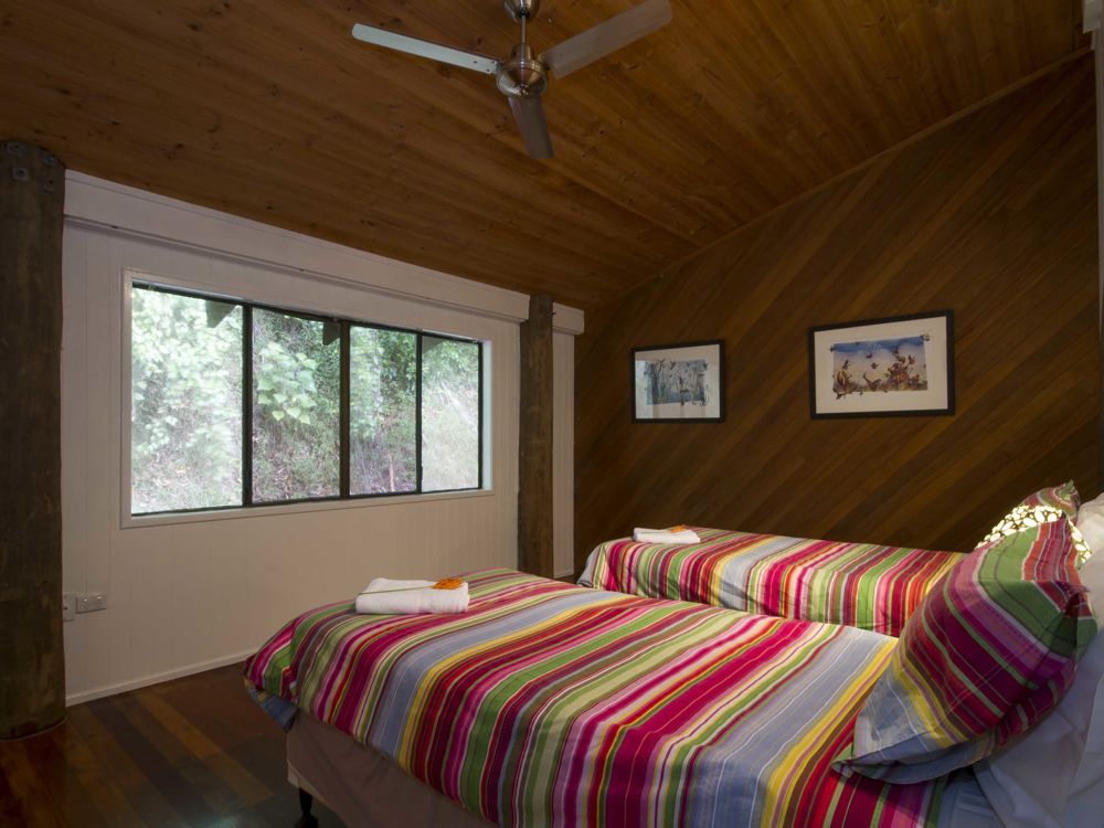 Very large third bedroom, feature timber poles