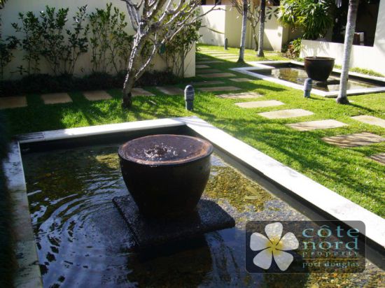 Water feature in front of your beachfront villa