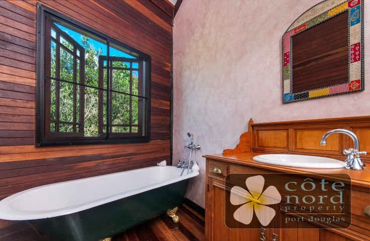 Bathroom with bath and separate shower