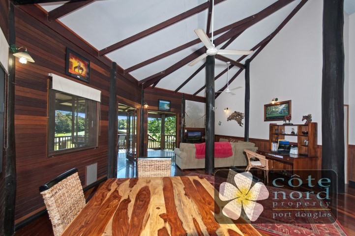 Cathedral ceilings and timber beams add ambiance