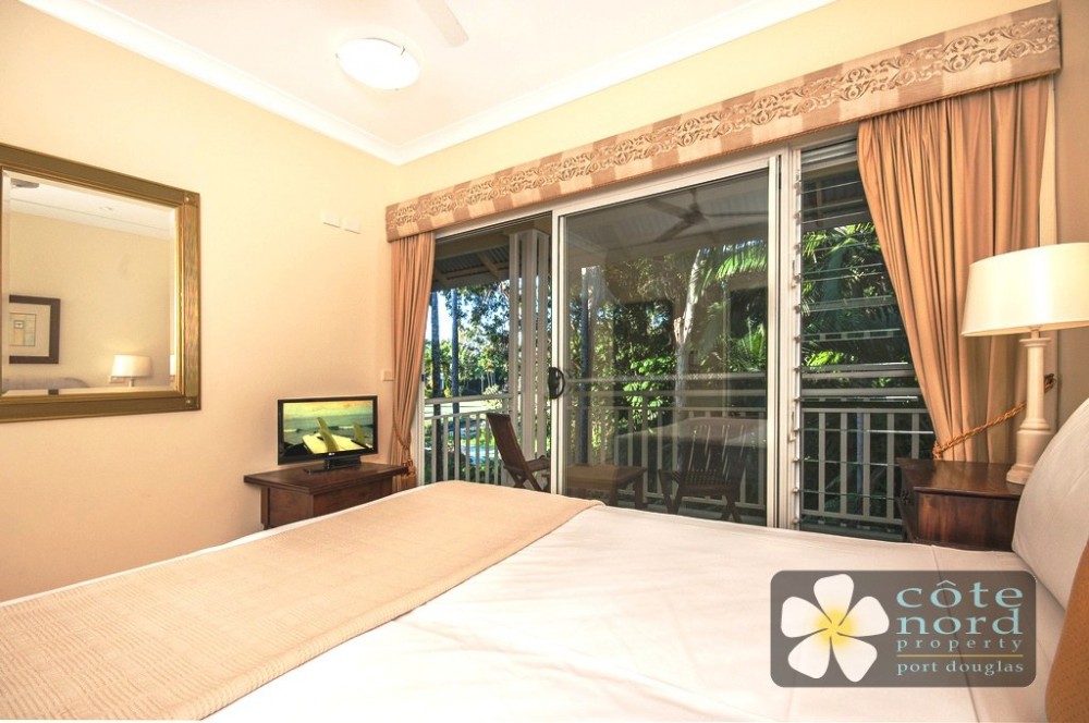 Main bedroom with rainforest garden views