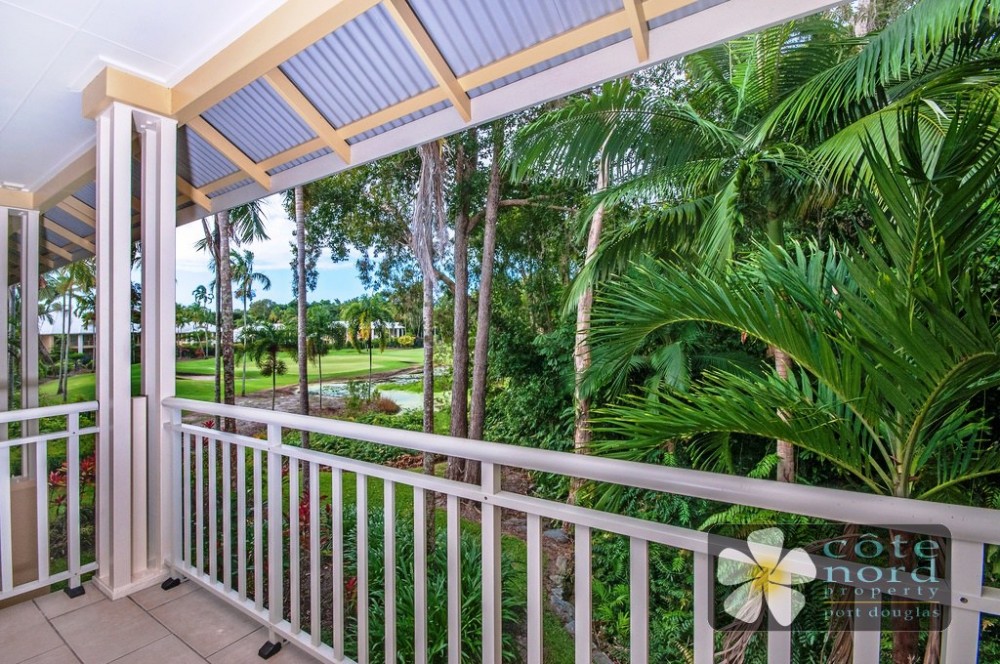 Main bedroom balcony with golf and rainforest view