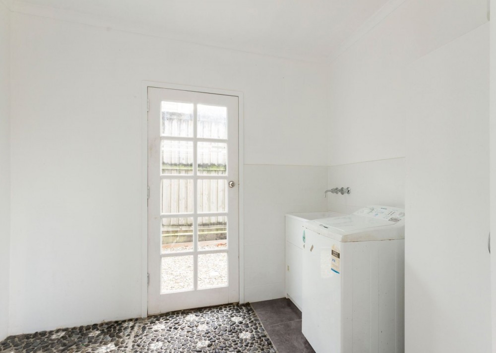 Practical laundry and toilet downstairs