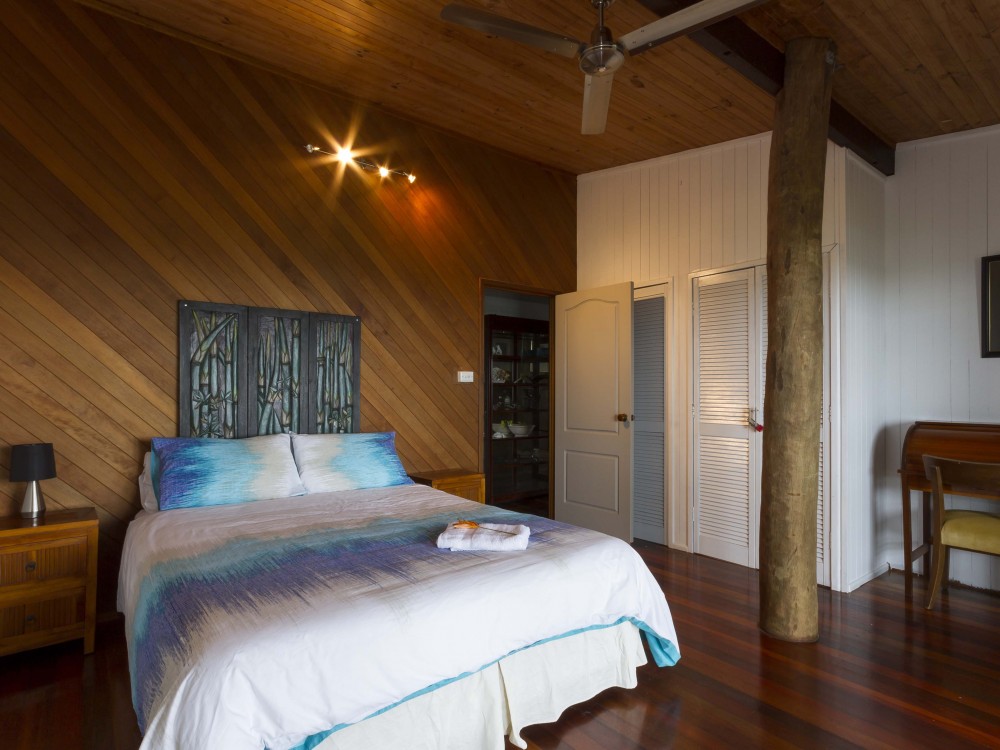 Spacious bedroom, timber touches