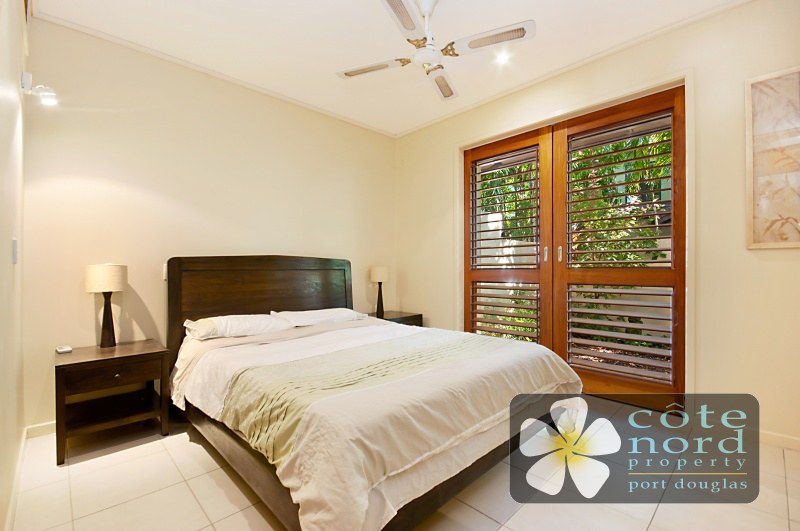 Spacious main bedroom with courtyard
