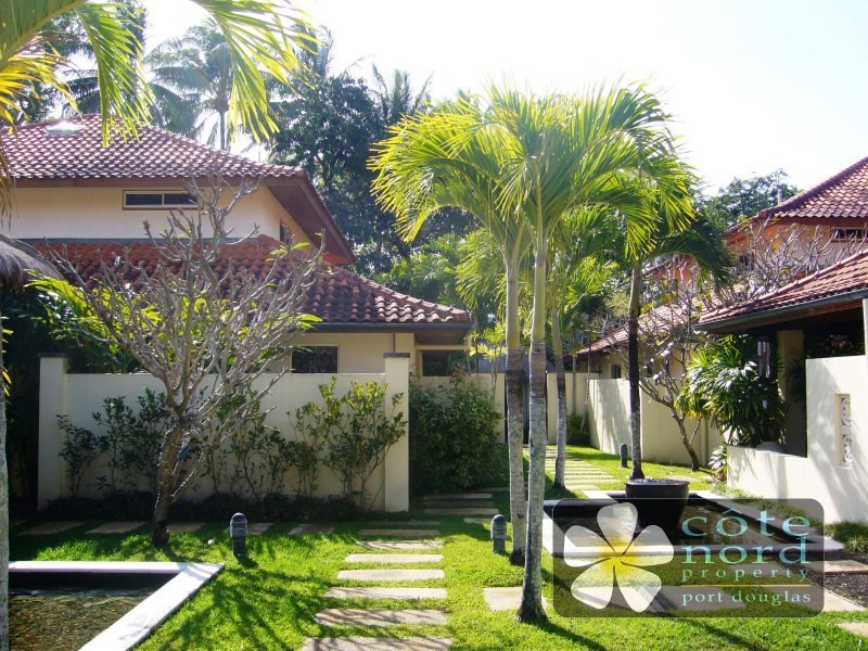 Serene Surya, water features sparkling in the suns