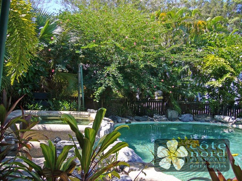 Jacuzzi by the resort swimming pool