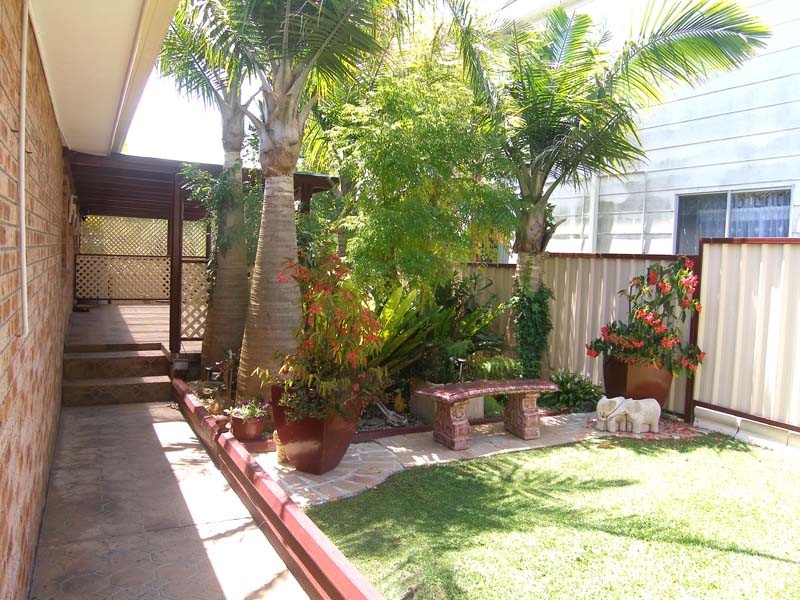 Rear yard looking BBQ area