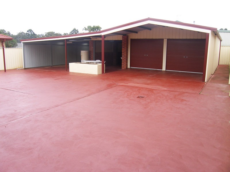 Double garage, carport & BBQ area