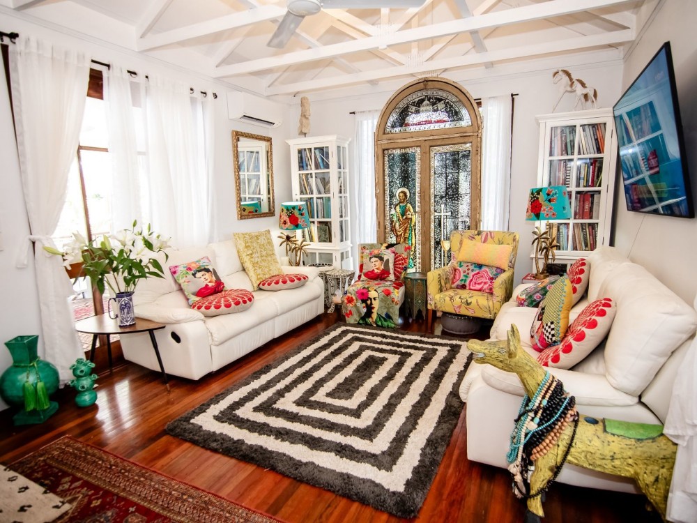 Upstairs living area, high ceilings, exposed truss