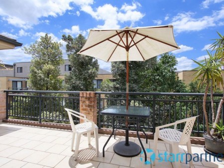 STUNNING TOP FLOOR UNIT WITH ENTERTAINERS BALCONY