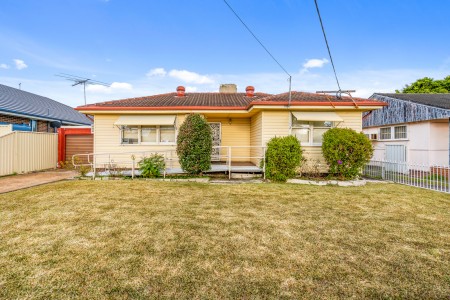 NEAT HOME IN A GREAT LOCATION