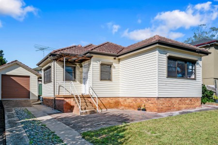 SPACIOUS FAMILY HOME ON THE HIGH SIDE OF THE STREET