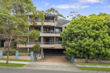 UPDATED UNIT WITH DUAL BALCONIES