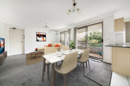 Location, Location, Location! Two Bedroom Top Floor Unit with Gas Cooking and Air Conditioning!