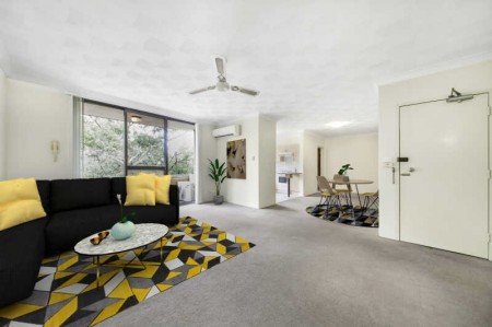 Perfectly Located Air Conditioned Two Bedroom Unit and Lock Up Garage!