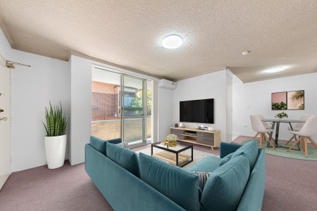 Air-Conditioned Two-Bedroom Elevated Ground-Floor Unit with Single Garage!