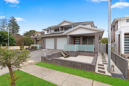 STUNNING HIGH-SIDE DUPLEX HOME