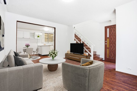 Air-Conditioned Three Bedroom Townhouse with Large Easy-Care Courtyard and Single Garage!