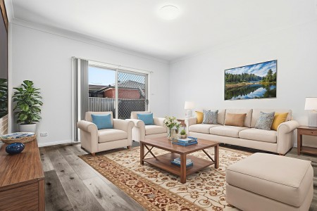 Immaculate Air-Conditioned Updated Three-Bedroom Duplex with Single Garage!