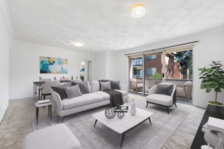 First-Floor Full Brick Two-Bedroom Unit with Single Garage!