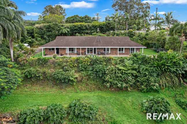 Solid four bedroom brick home on 4.1 acres.