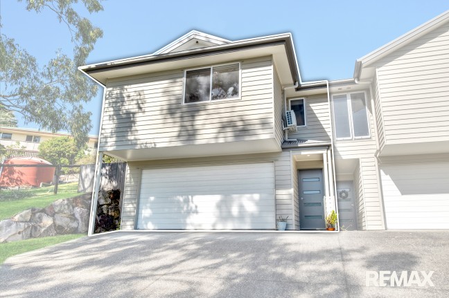 Spacious 3-Level Duplex with Private Yard, Double Garage & Entertainer's Living