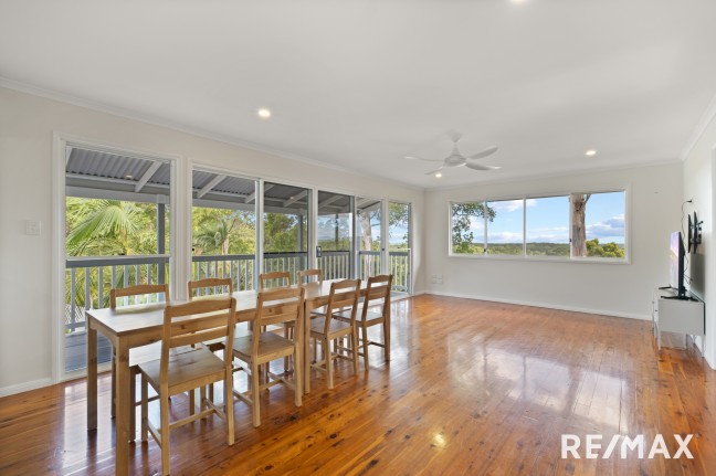 Stunning 4 bedroom home with wrap around deck and magnificent views in quiet cul-dec-sac.