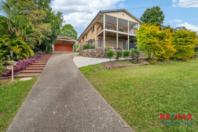 Spacious & Elevated Four bedroom home with huge shed/mancave & amazing views from front deck.