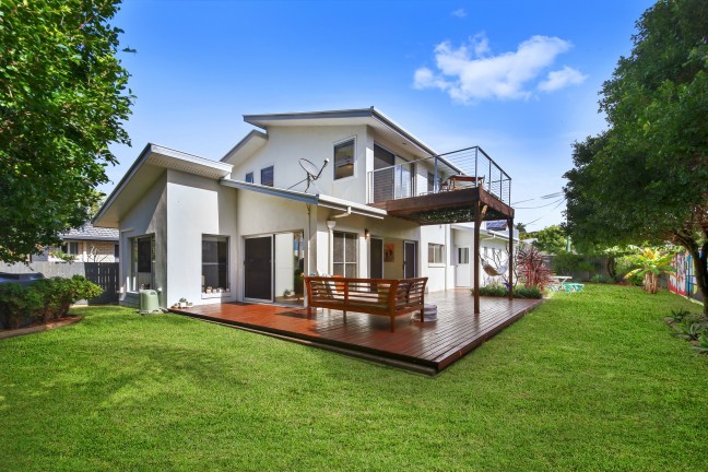 MODERN FAMILY-SIZED HOME WITH SIDE ACCESS NEAR THE BEACH