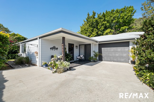 Comfortable Elevated Home with Great Views & Prime Location!