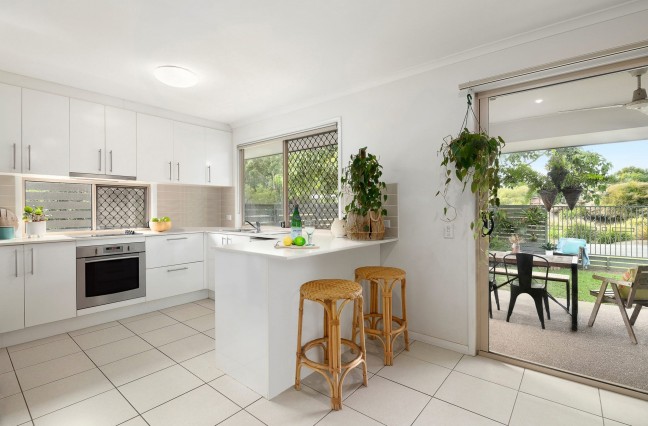 Just Sold - Modern Duplex in Sought-After Meridan Plains