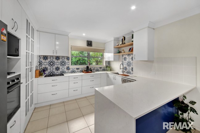 Four bedroom home with air conditioning overlooking hinterland.