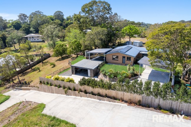 Three bedroom home on half-acre block with multipurpose/mancave/entertainment room.