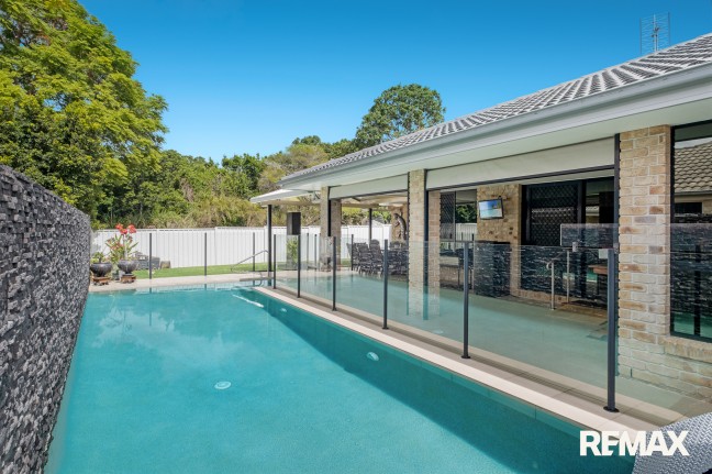 Expansive Single Level Living: Lap Pool, Solar, Fully Fenced Flat Block!
