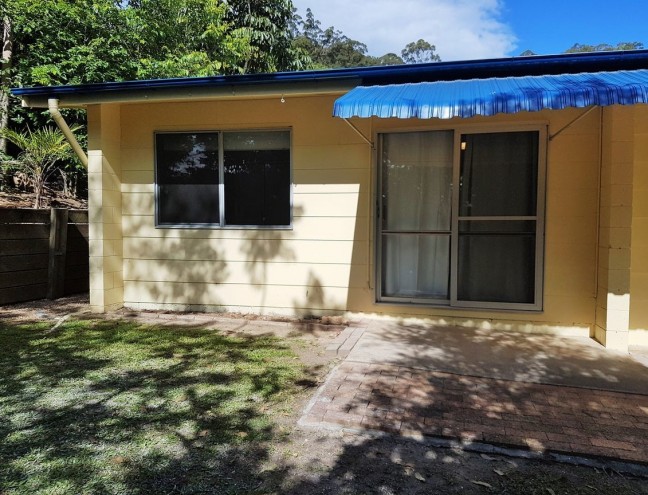 Low maintenance 1 Bedroom Unit with Remote Garage and close to shops