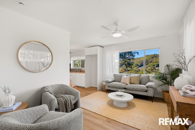 Renovated One-Bedroom Retreat with Deck, Carport & Bonus Utility Room