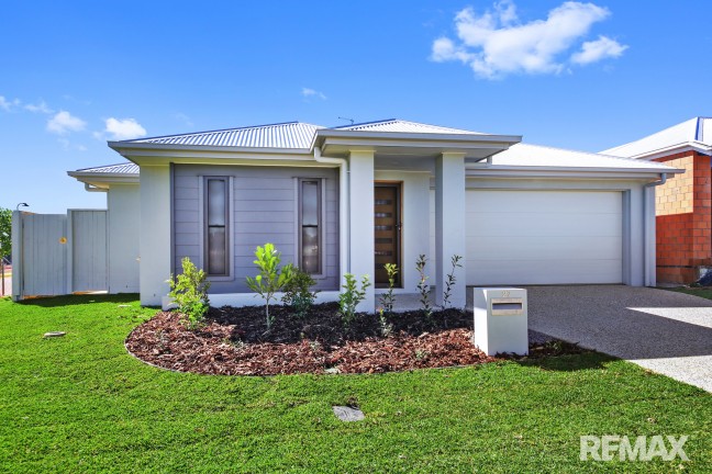 Brand New 4 bedroom home with multiple living areas in newly developed estate.