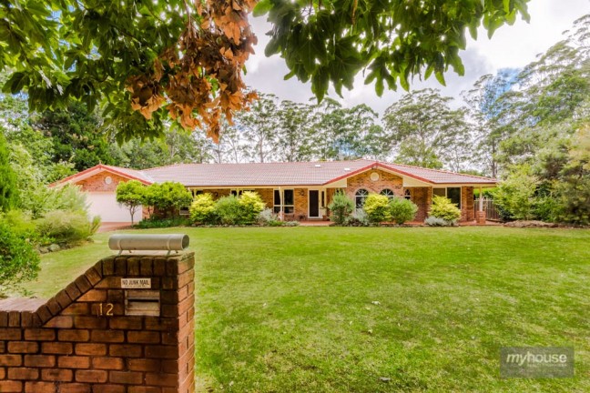Expansive, Quality Built Home in Beautiful Treed Setting