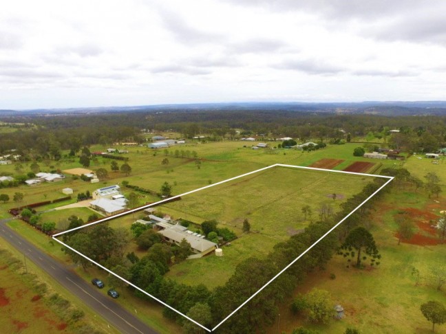 ~ Family Home on over 5 Acres in Superb Location ~