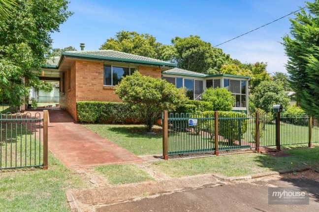 Immaculate Brick Home on Large Allotment!