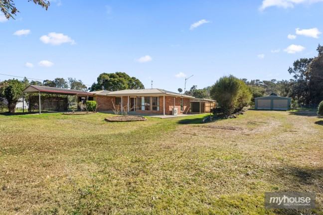 Renovator's Dream on over an Acre with 2 Street Frontage!