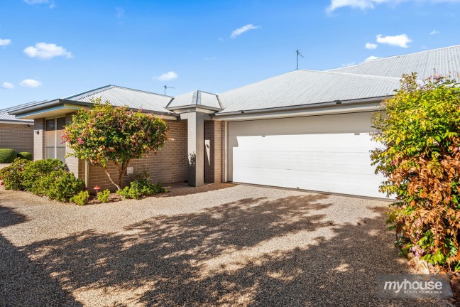 Spacious 'As New' Unit with Rare Double Garage!
