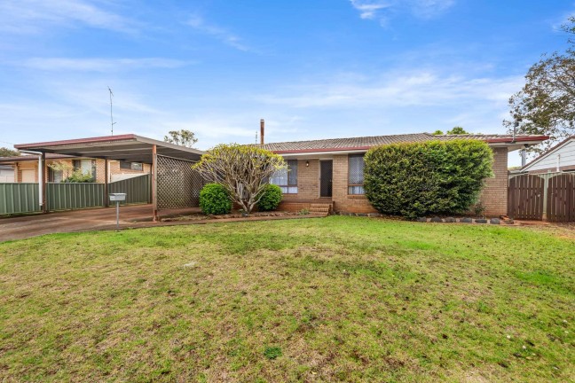 Comfortable Family Living in a Sought-After Darling Heights Location!