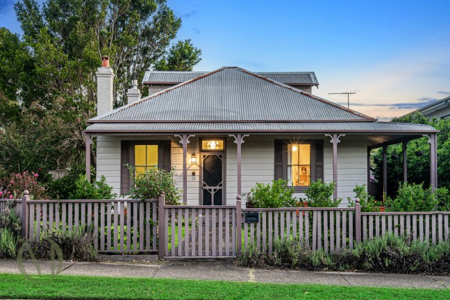 Classic Charm in a Coveted Corner Block Home!