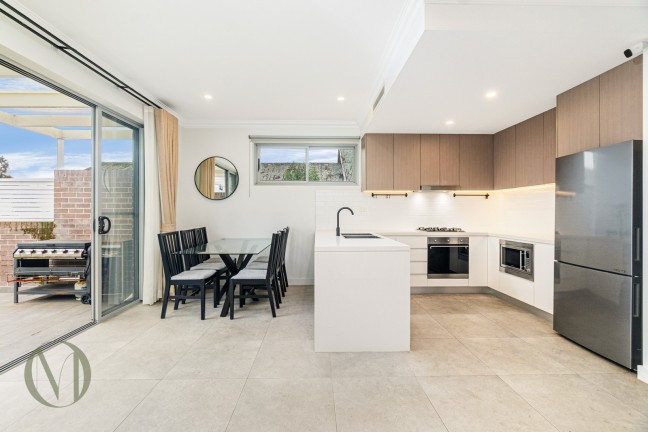 Modern Multi-Level Townhome Offering Exceptional Space & Comfort
